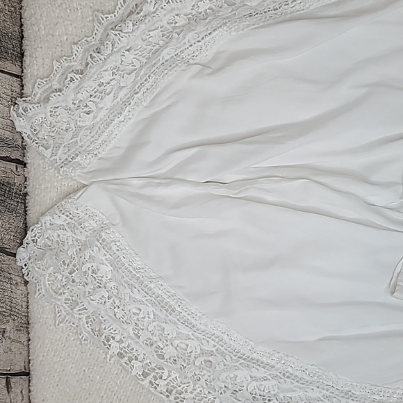 Goa Beachwear by Japna Tulip Crop Pants with Crochet Lace Detail in White - Picture 13 of 17